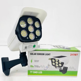 Guardio™ | LED šviestuvas su kameros imitacija ir judesio davikliu
